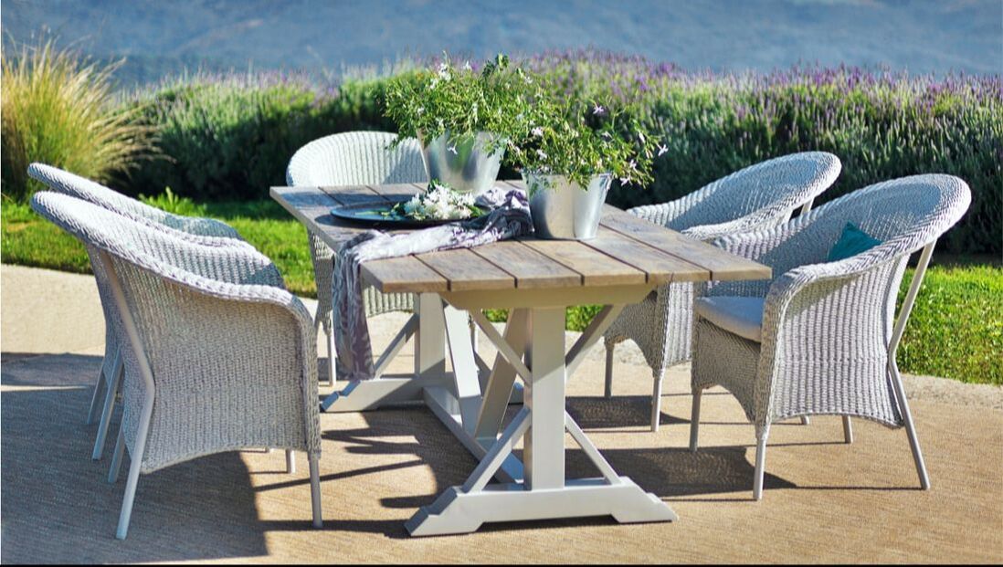 garden set in aluminium and timber top with five wicker armchairs in the hill at the top of manilva
