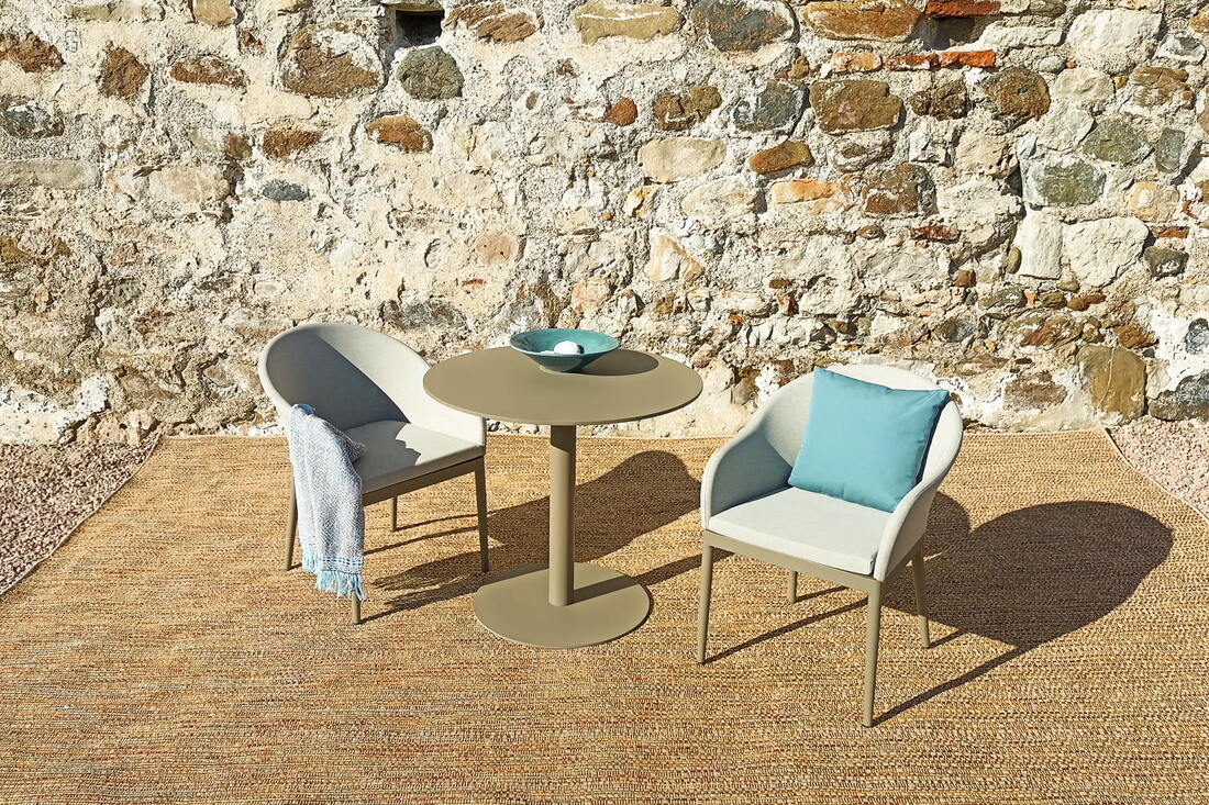 round table for gardens and terraces with 2 vogue armchairs made in spain in aluminium and outdoor calima fabric