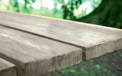 teak wood from Indonesia in grey colour used for the design of high end outdoor furniture in spain