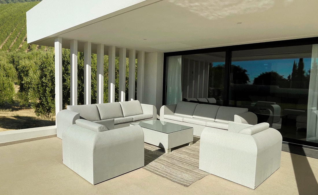 Porofin garden XXL sofas from the collection Nuage placed in a house near Sierra blanca los halcones