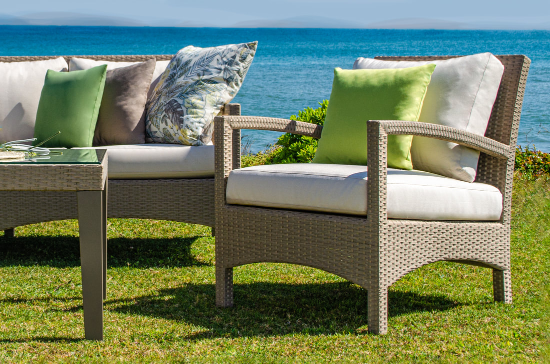 brown fibres sofas and stools with green garden cushions in marbella