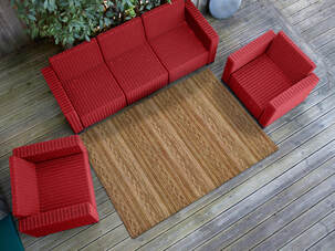 outdoor carpet in terrace with two cahirs and 3 seater sofa