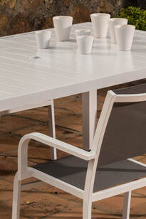 aluminium outdoor table and table in white lacquered colour in benahavis terrace.