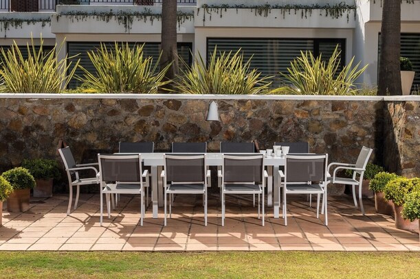 high end outdoor tables and armchairs in a Villa near La Duquesa de Los Granados in Manilva