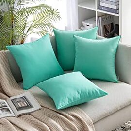 turquoise and blue cushions are the new black this season