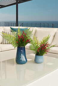 Decorative flower plants placed in a garden sofa made in Spain