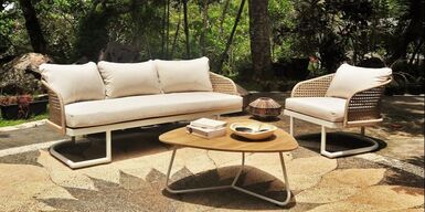 Sofa garden set in a tropical garden in Marbella, province of Malaga, Spain